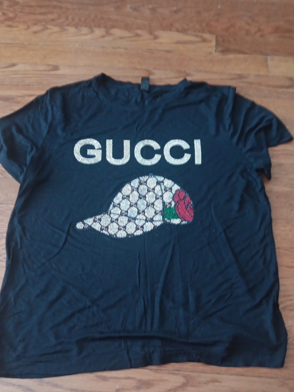 Gucci Black Tee with Gold Logo and Red Rose Accent